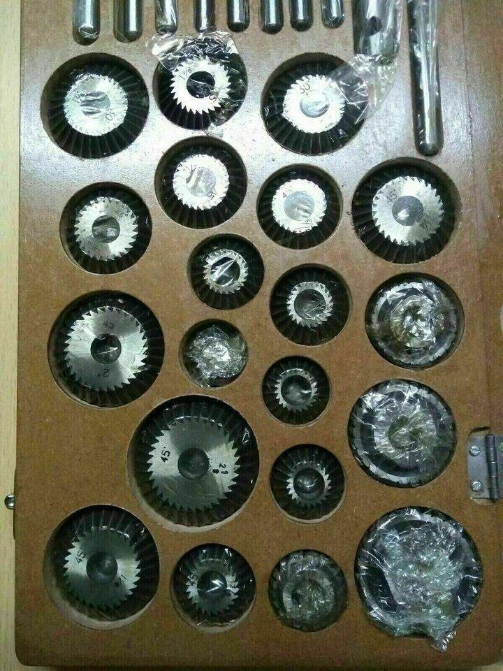 20 piece valve seat cutter set displayed in a wooden case for precise machining tasks