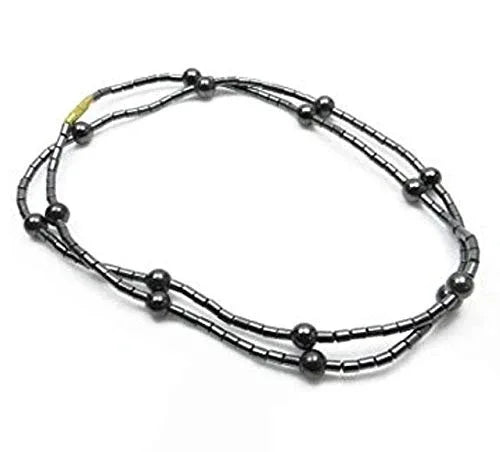 Magnet acupressure necklace with black bead-like chain links and round magnetic ends