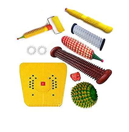 Yellow acupressure mat with wooden roller and spiky massage ball tools
