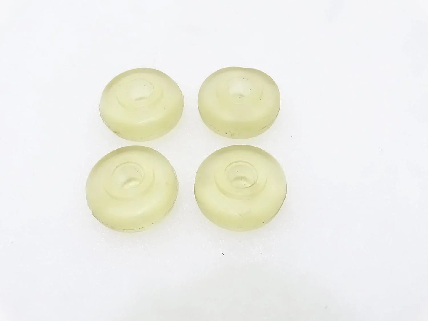 Car shocker bushings set of 4 light green circular pieces
