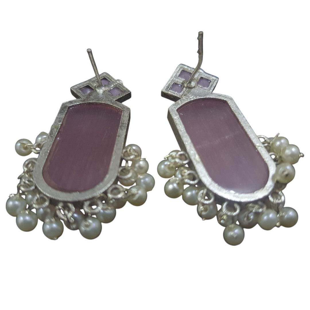 Amber pearls drop earrings featuring silver accents and delicate pearl embellishments