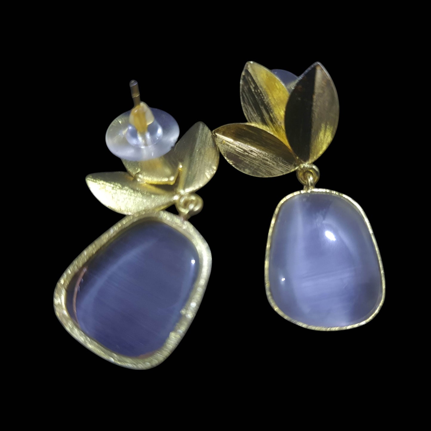 Stylish amber stone leaf design earrings with gold accents for a trendy look
