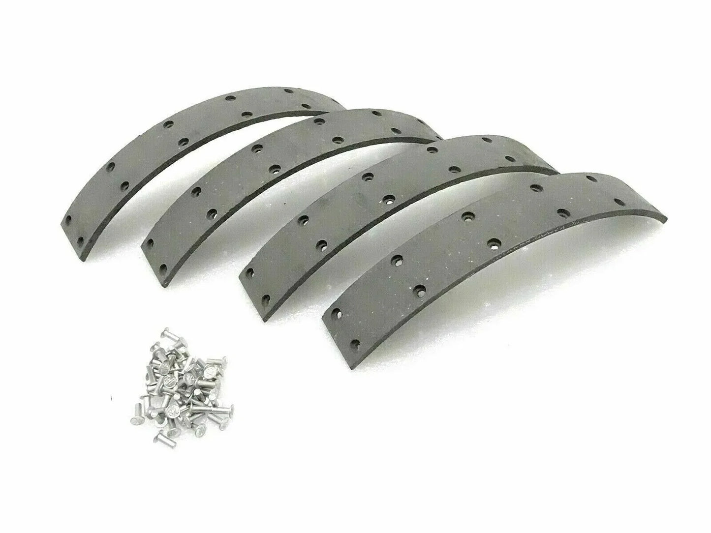 Rubberised brake lining set with four pieces for tractor maintenance, includes bolts for easy installation. Brake lining replacement cost.