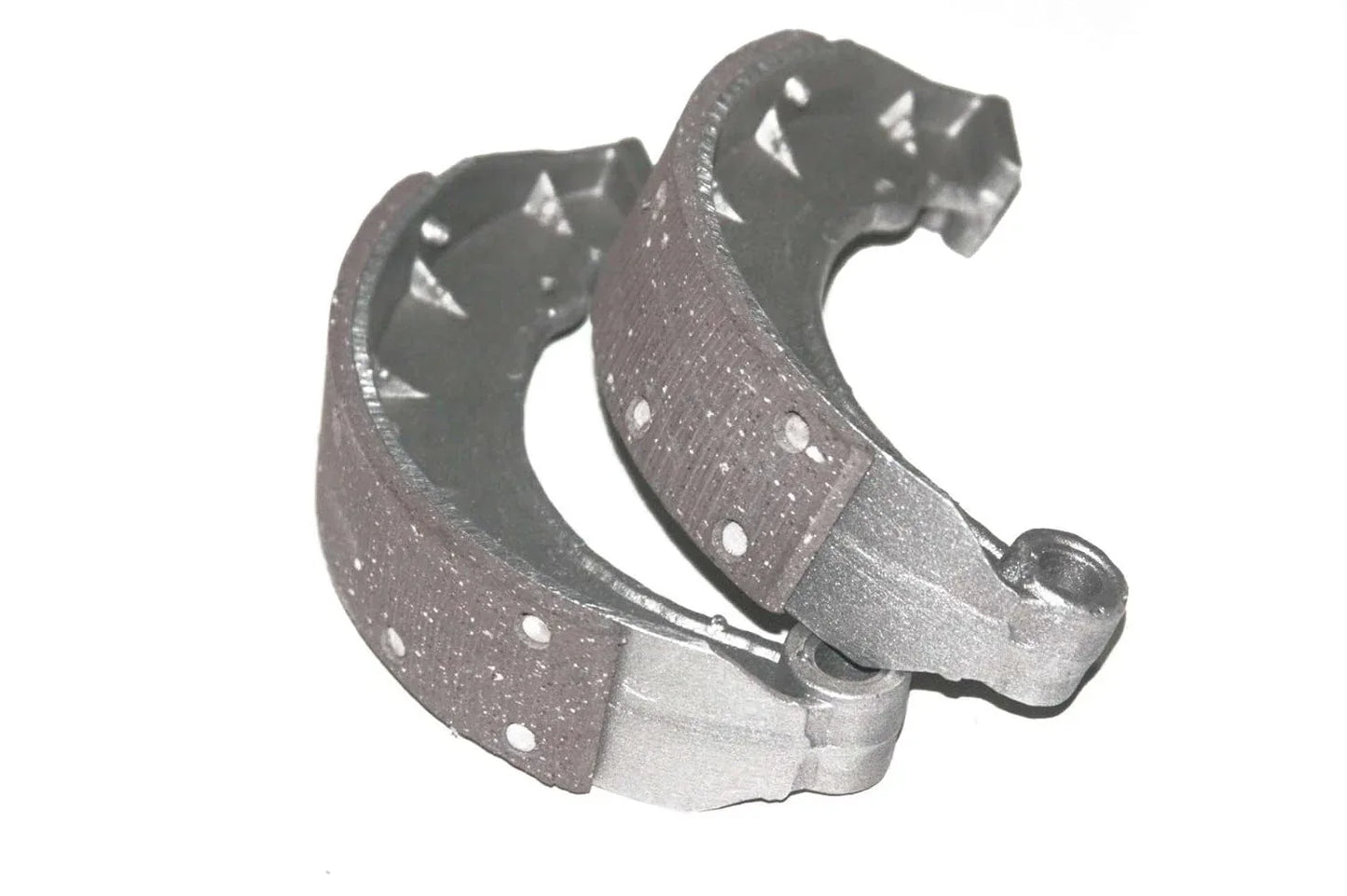 Front motorcycle brake shoe pad set, curved dark pads with rivets