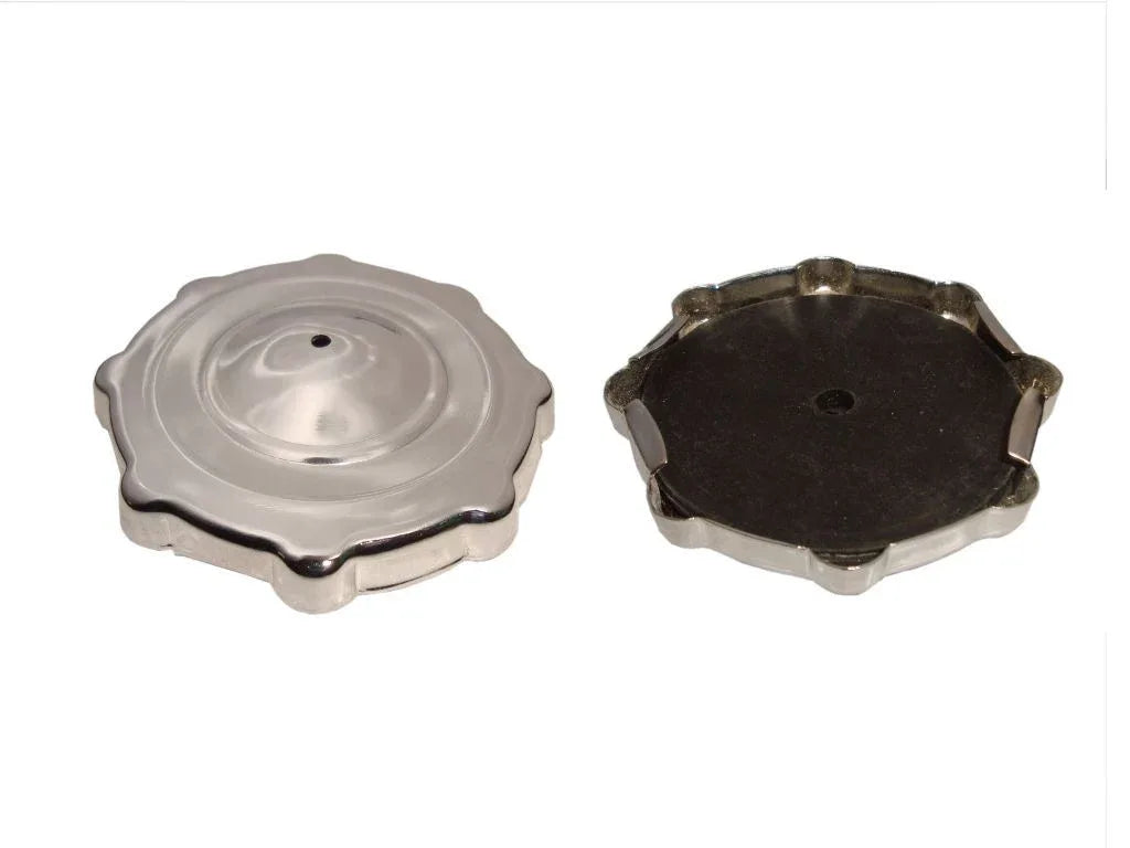 Push-style metal gas tank caps, round with locking tabs and center hole