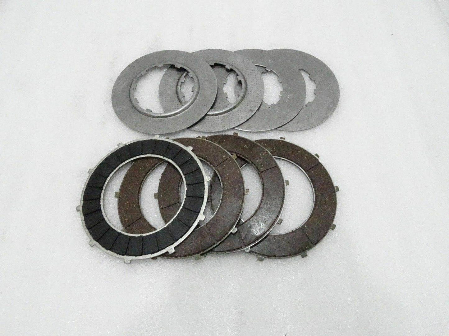4 speed clutch Plates set featuring durable friction and pressure plates for efficient vehicle performance