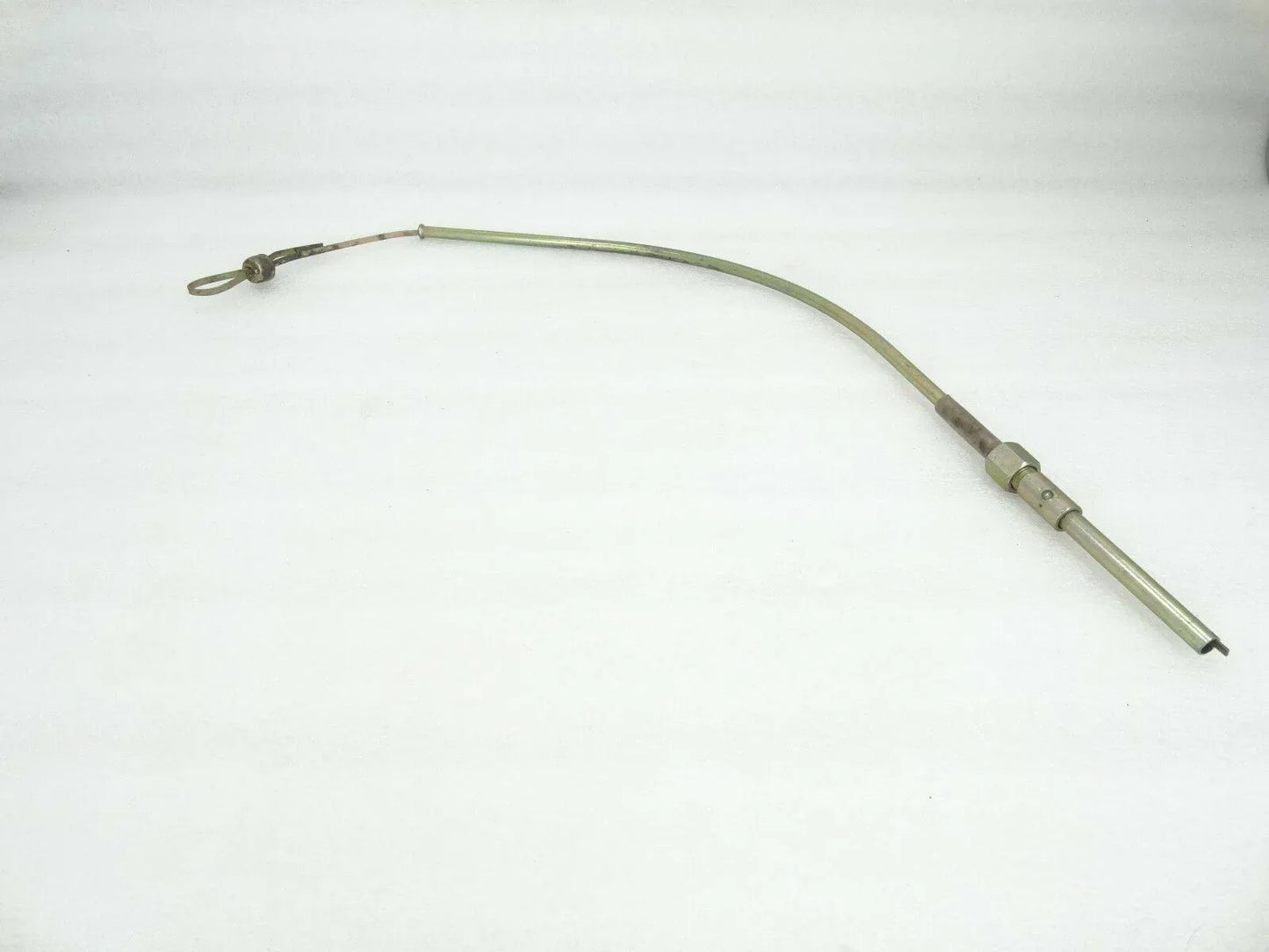Engine oil dipstick gauge tube with loop handle and connector