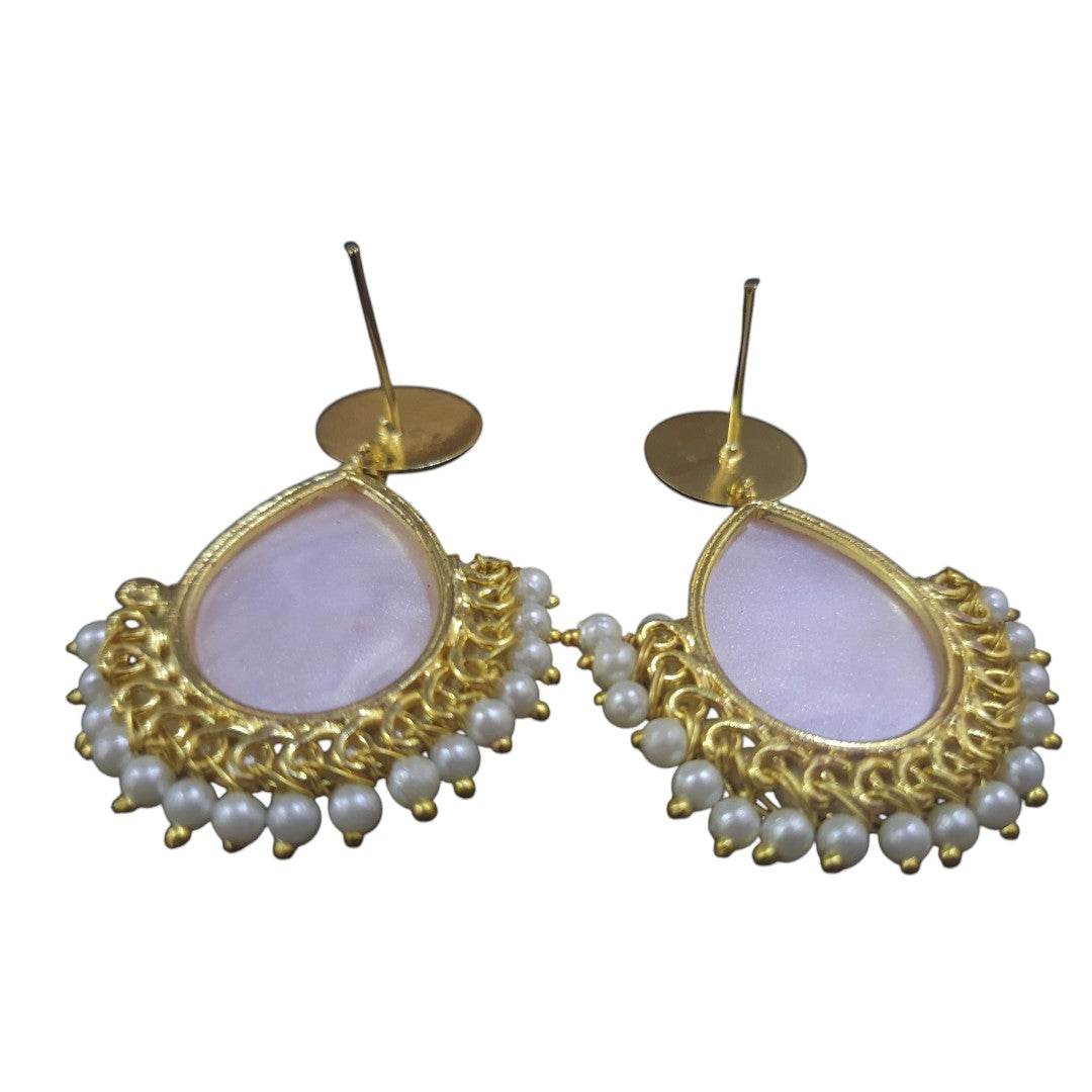 Handcrafted brass pearl earrings featuring gold-tone detailing and delicate pearl accents