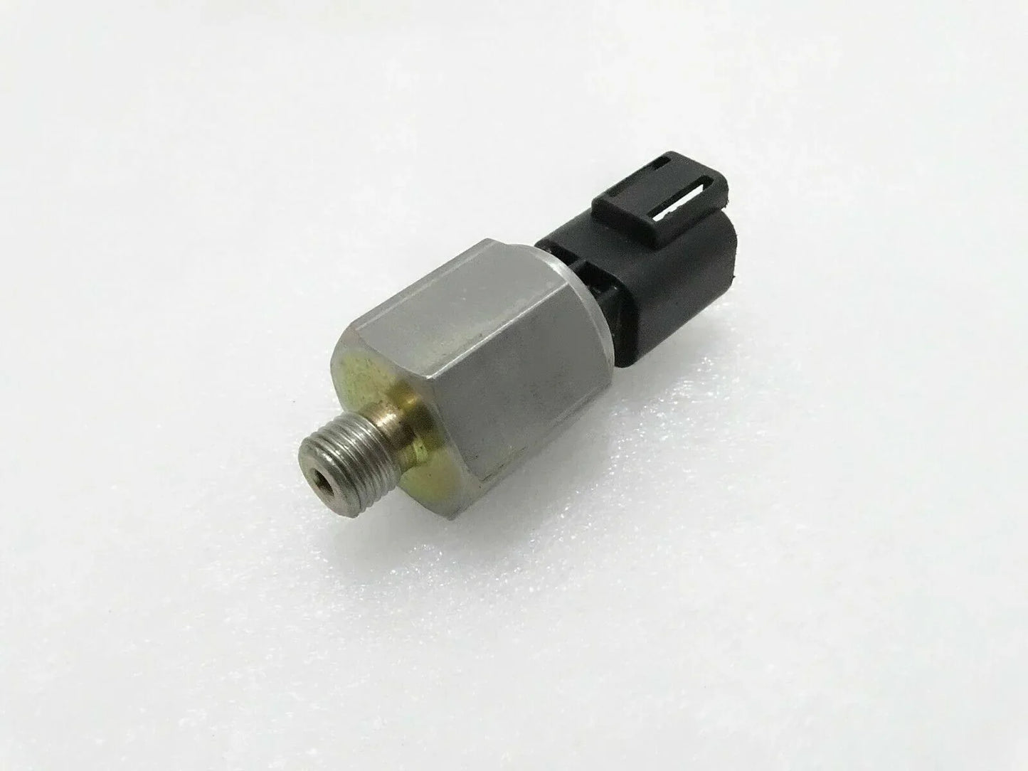 JCB 3CX oil pressure switch, stainless steel, compact size, essential for engine oil monitoring