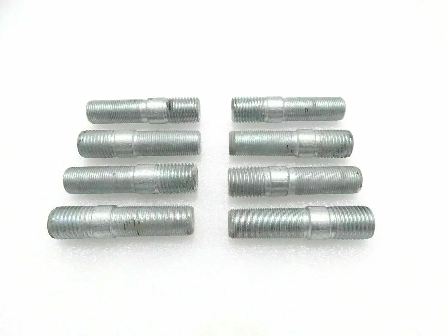 Set of JCB backhoe loader exhaust manifold studs, steel, threaded design for durable engine installation