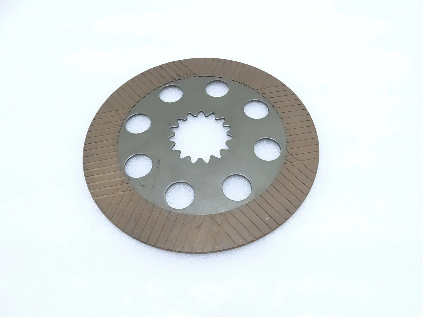 Brake friction plate with circular disc, six bolt holes, and toothed center