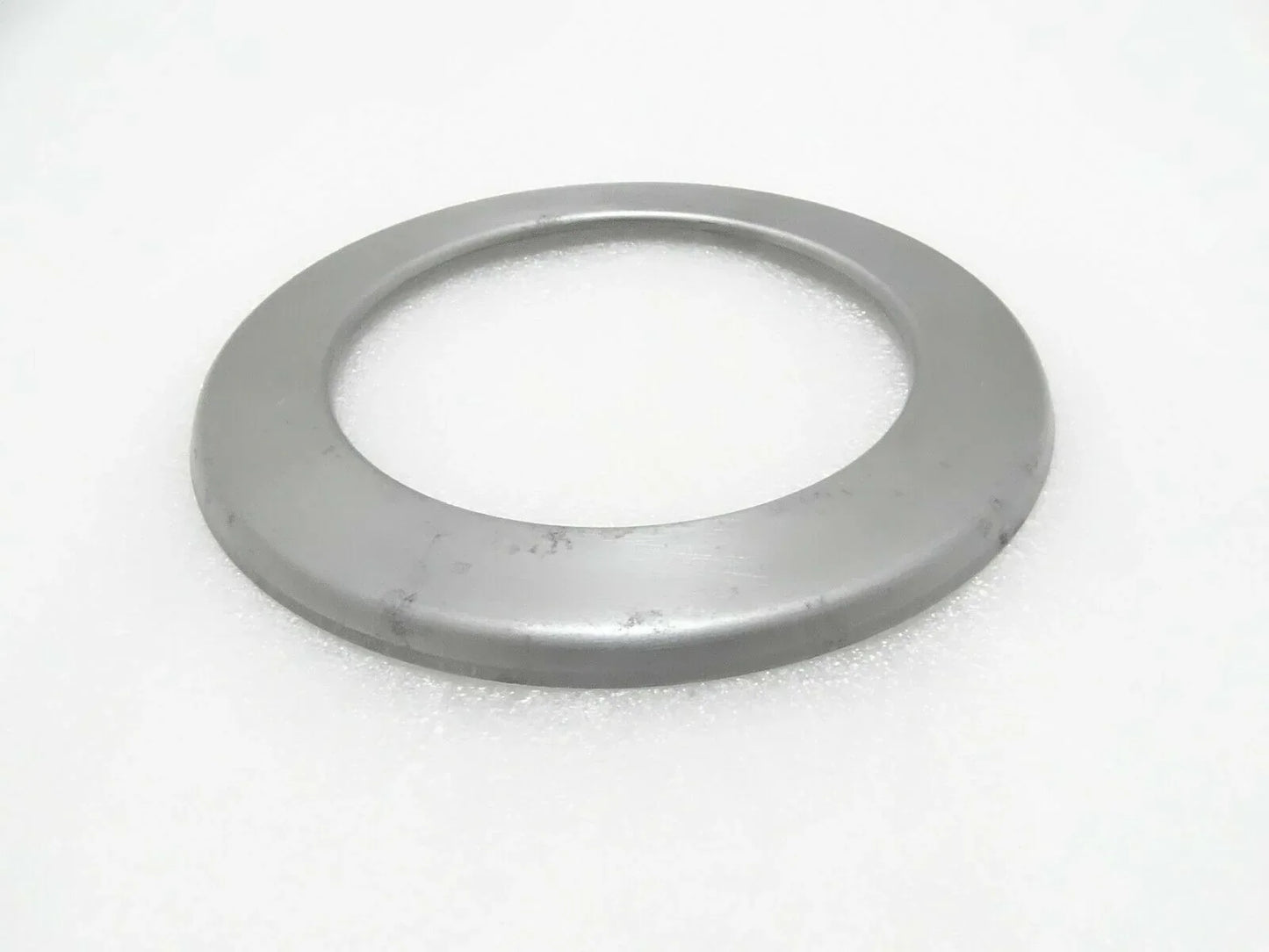Gray metal hub seal cover ring with center hole, part 458/20403