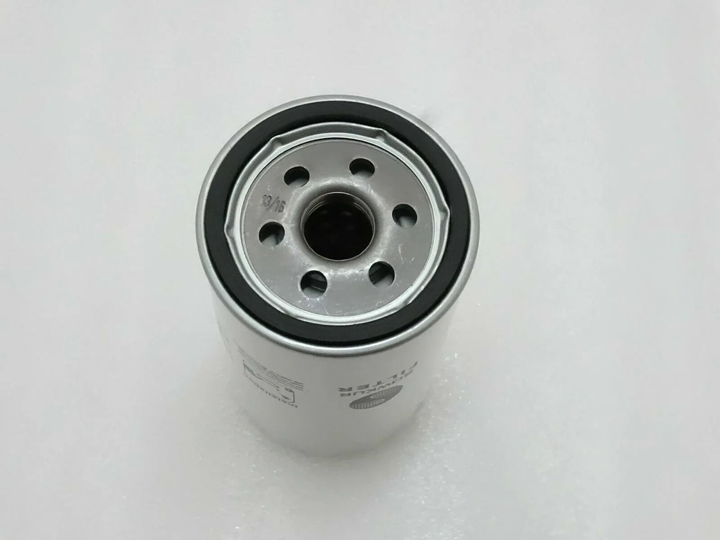 Hydraulic filter cartridge with metal end cap and center black seal