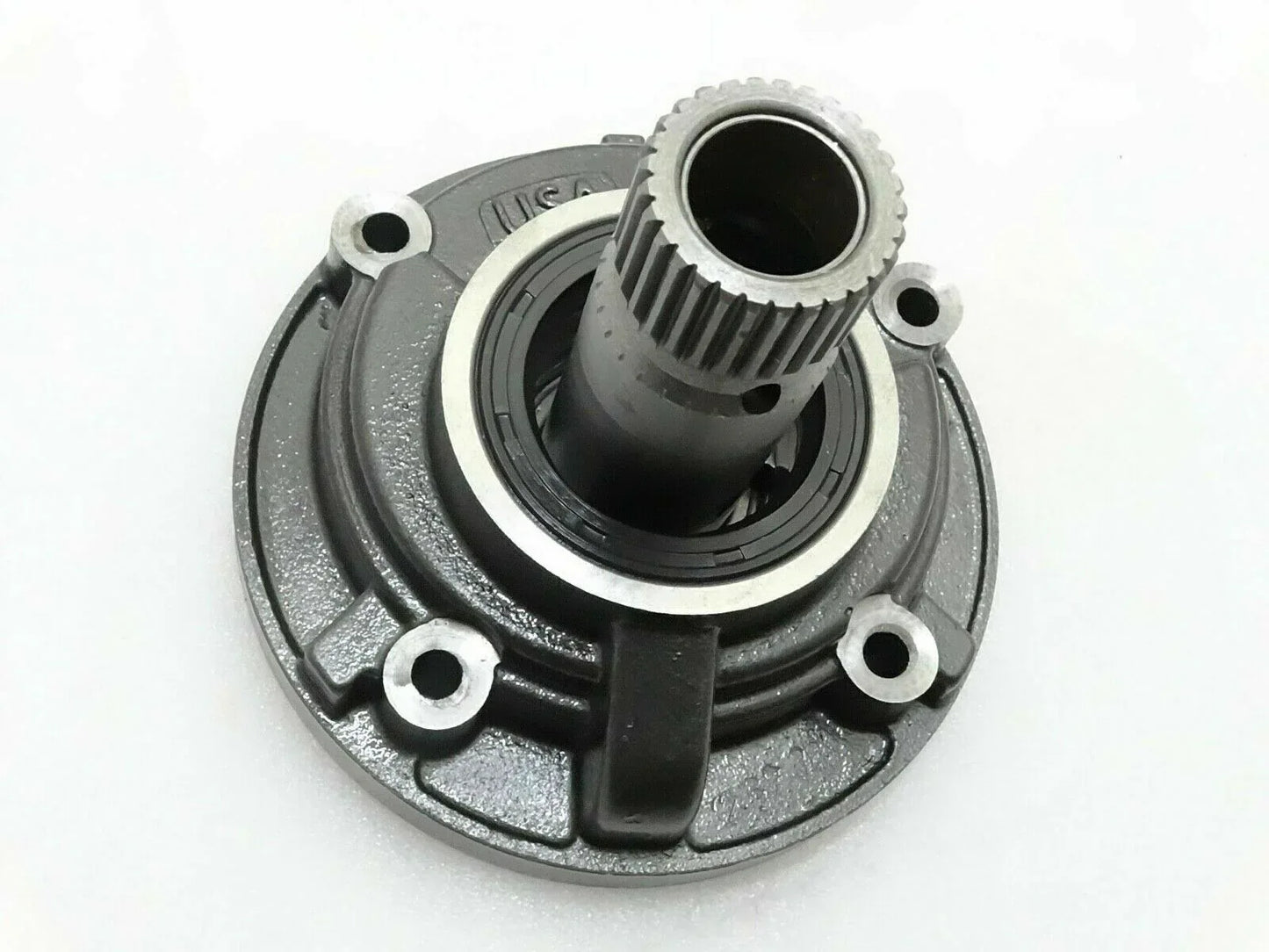 Hydraulic pump transmission, gray metal housing with central black splined inlet