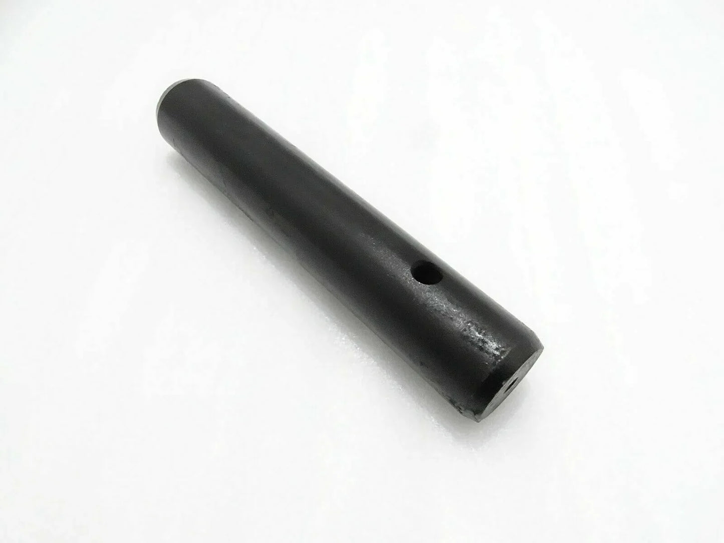 Black metal pin with side hole for mini digger attachment