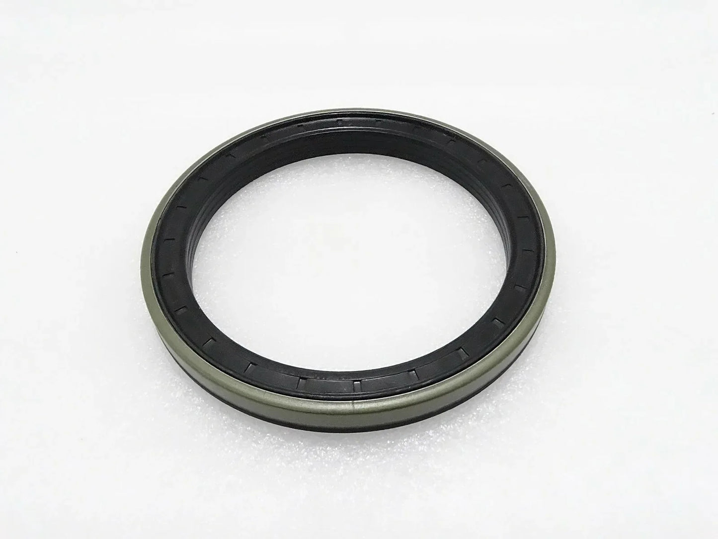 Rubber oil seal ring with black outer lip, circular profile