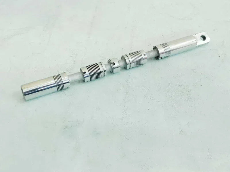 Hydraulic spool valve assembly with metal shaft and stepped spool body