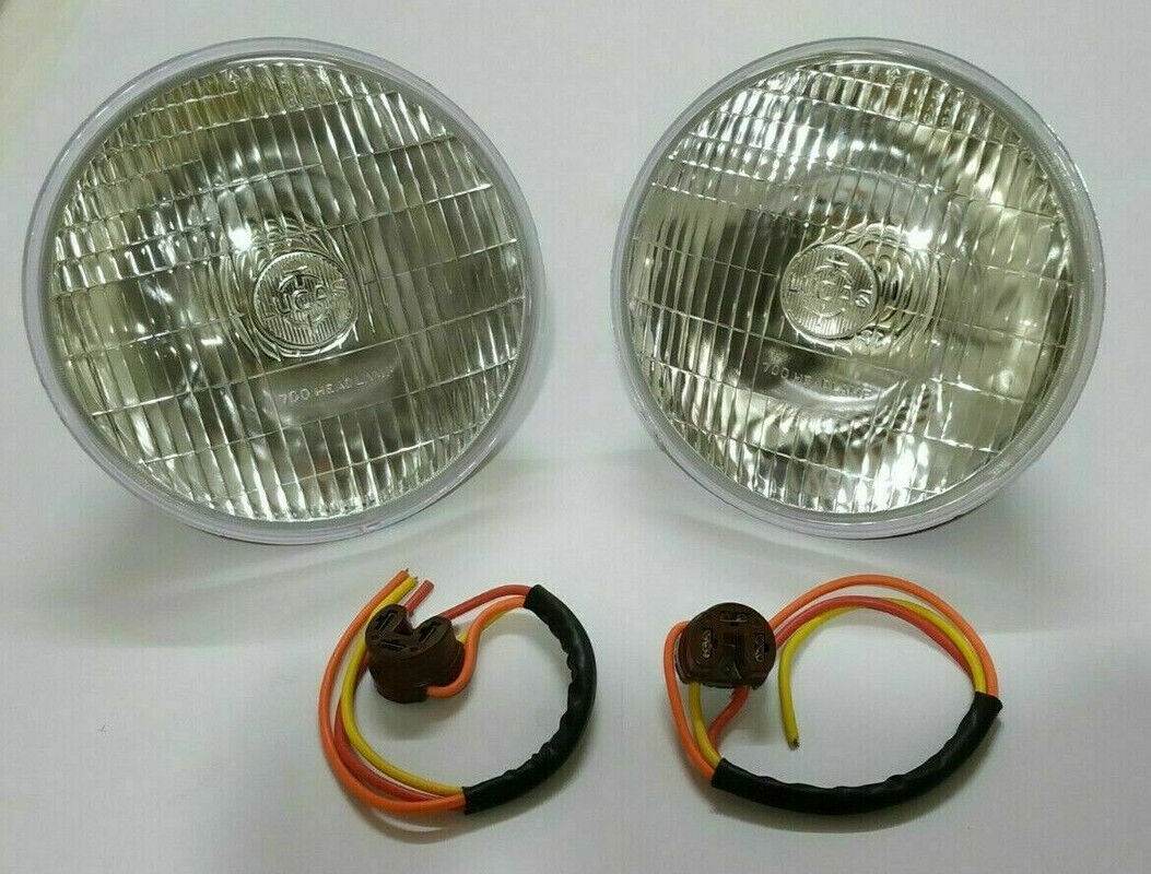 Lucas 700 headlight conversion lamp set with two round headlights and wiring connectors