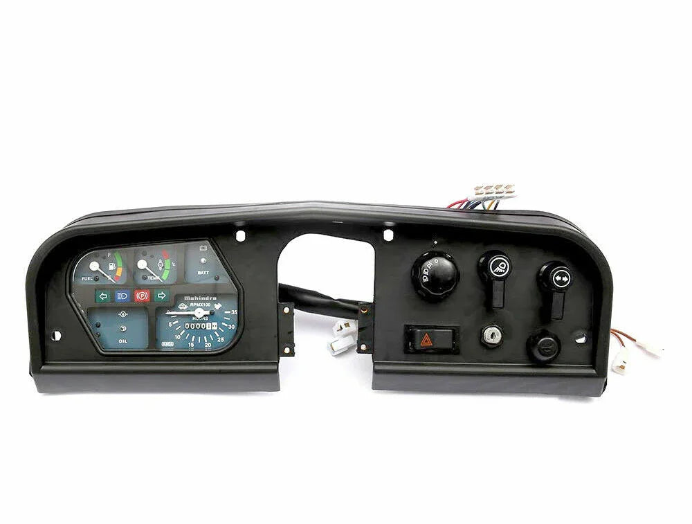 Tractor dashboard instrument panel with gauges, switches, and wiring connectors