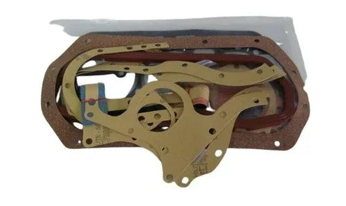 Tractor cylinder head gasket set with multiple brown gaskets and metal seals