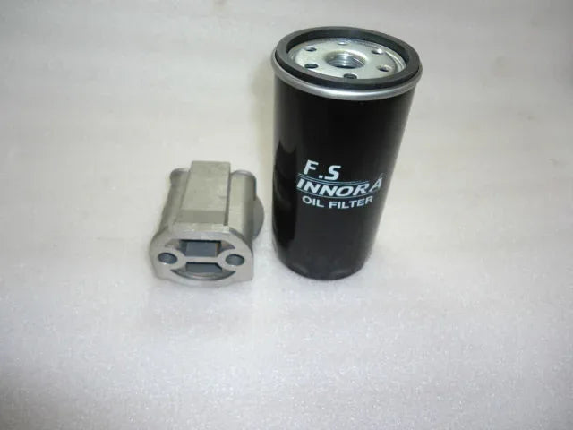 Oil filter head assembly for Massey Ferguson model with metal component and cylindrical filter