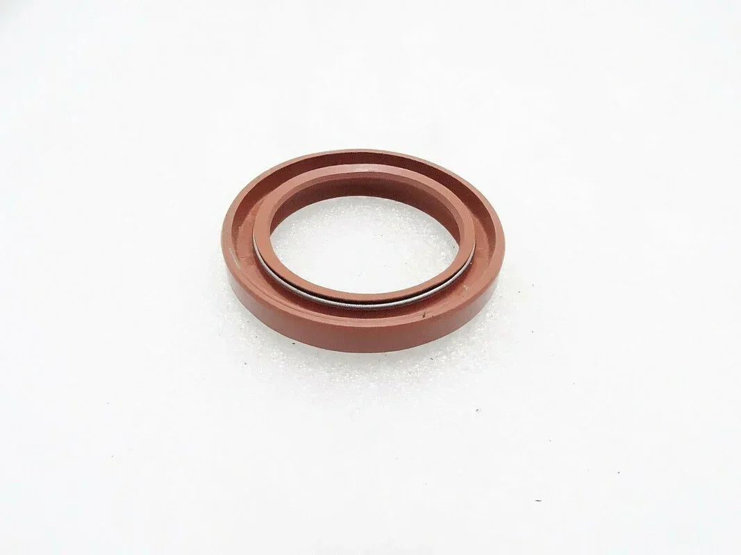 Tractor timing cover seal ring with brown outer edge and inner opening