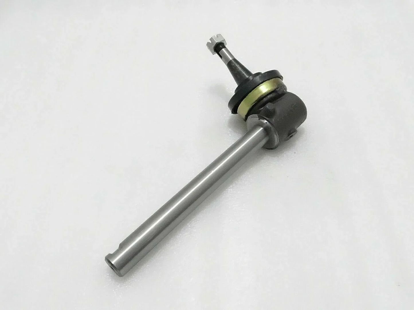 Spindle shaft for Massey Ferguson model, sturdy steel construction, designed for reliable tractor performance