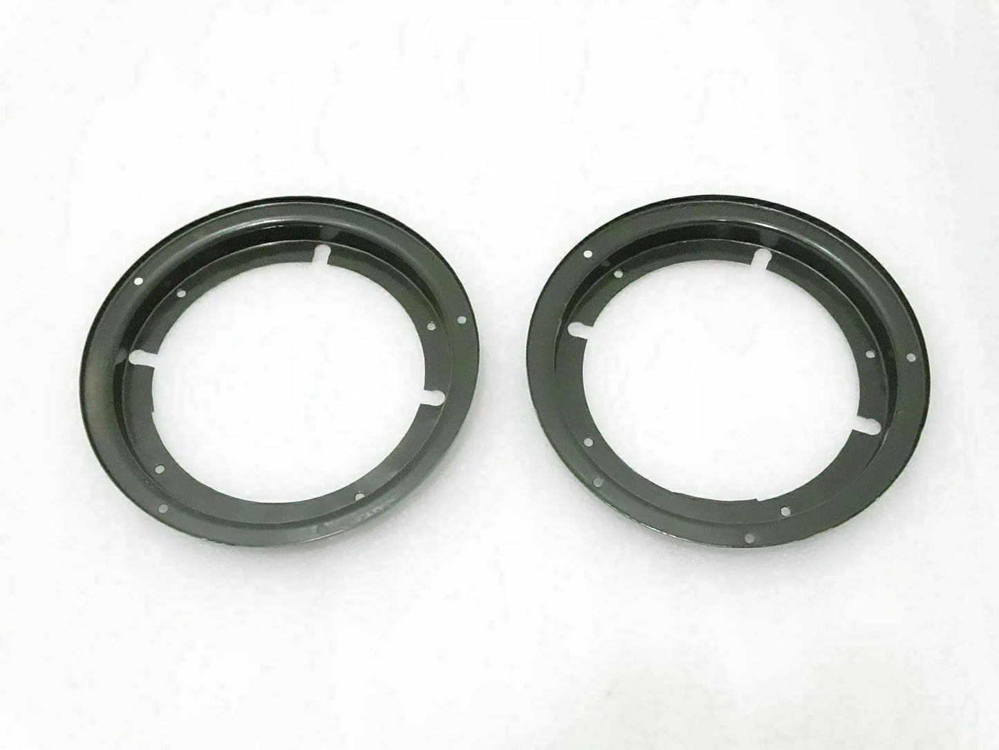 Headlight retaining inner bezel set, two black circular rings with mounting holes
