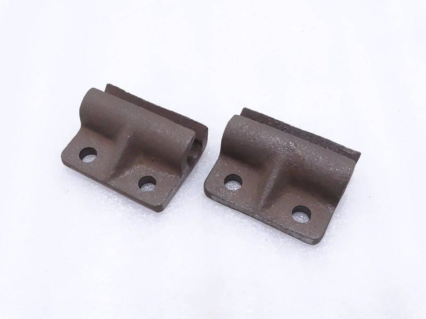 Tailgate door hinges, dark metal with bolt holes