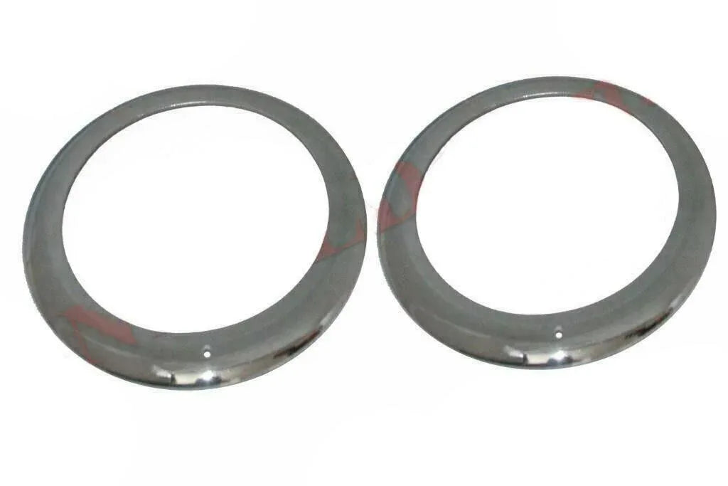 Chrome-plated headlight outer bezel pair, two circular rings with mounting holes