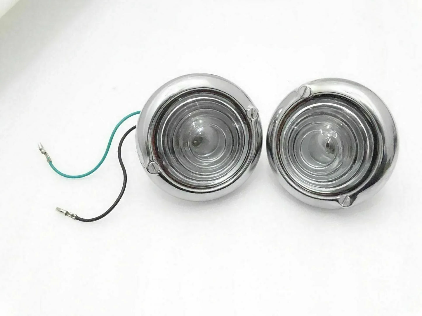 Pair of chrome clear turn signal indicator lights with round lenses