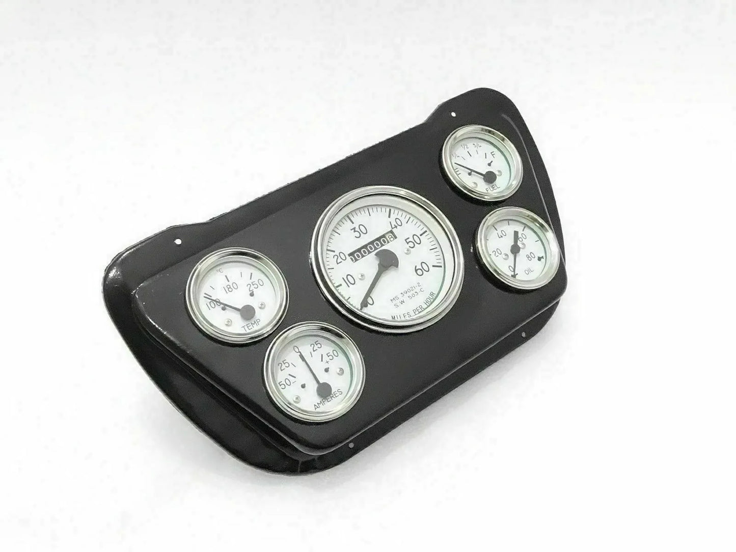 Black gauge mounting plate with four white-faced round instruments, bezel rings
