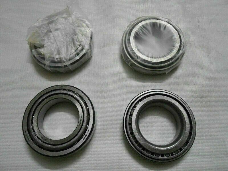 Wheel bearing kit with four metal bearing rings, includes stacked parts in bag