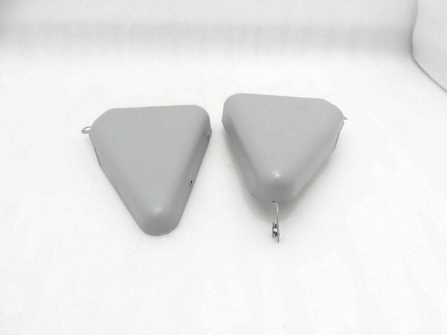 Raw Steel Norton Commando side panels covers in gray for motorcycle restoration