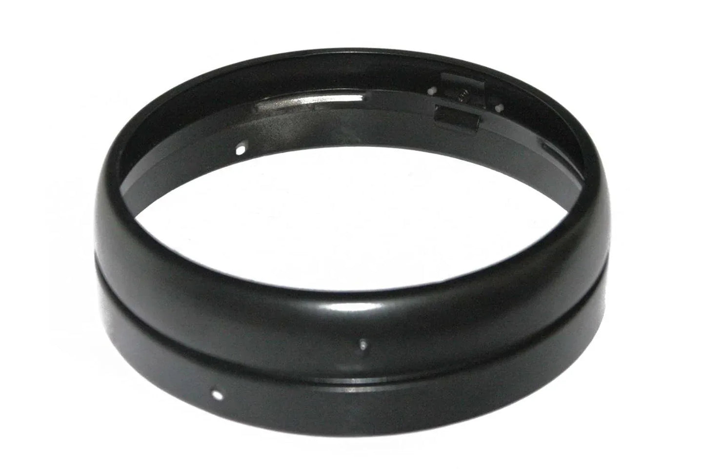 Black powder-coated headlight rim with smooth circular edge
