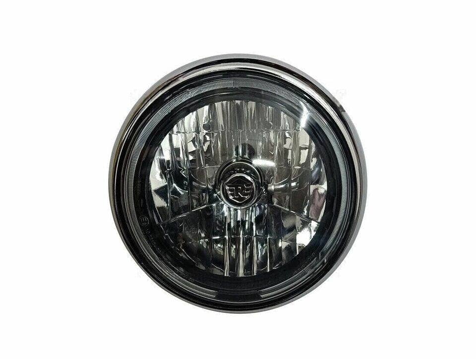 Royal Enfield Meteor headlight assembly with a round design and halogen bulb
