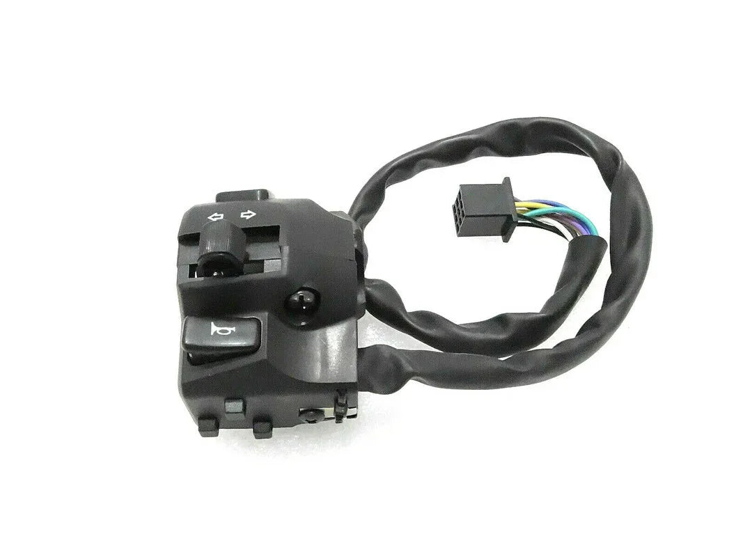 Royal Enfield switch assembly made of durable plastic, featuring controls for lights and indicators