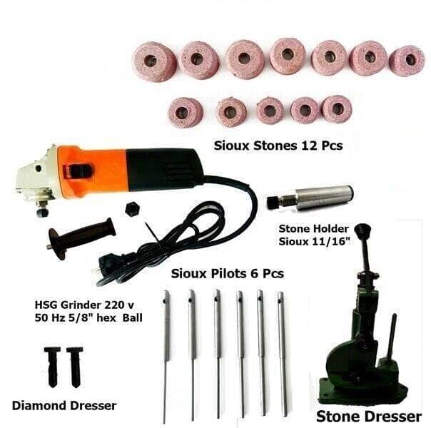 Valve seat grinder kit including Sioux stones, grinder, pilots, and dressers for precision restoration.