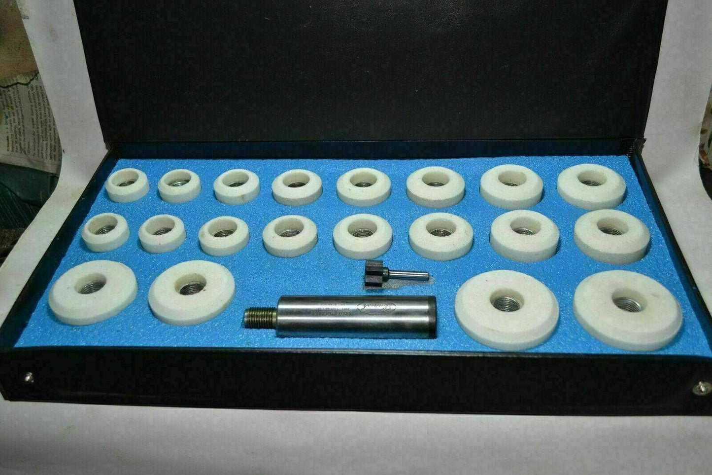 Sioux valve seat grinder stones kit with various sizes of stones and holder in a protective case