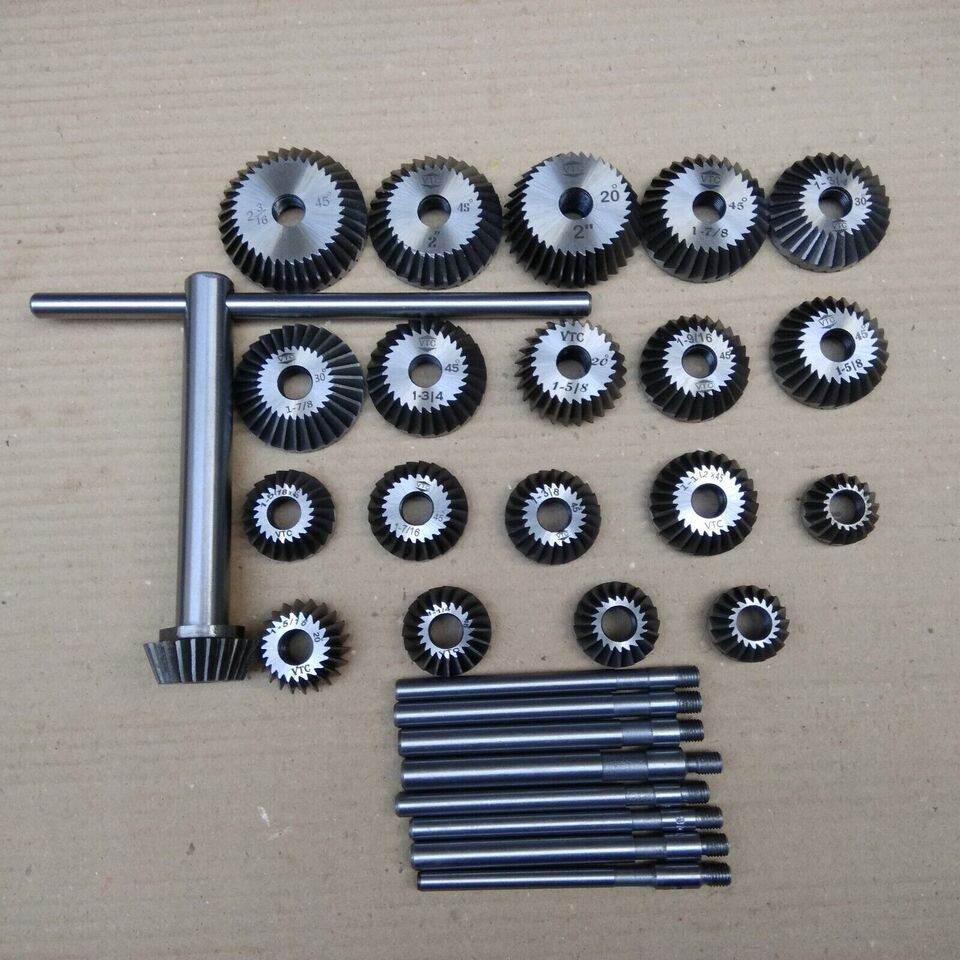 Valve seat cutter set includes various sizes of cutting tools for precision machining and automotive repair