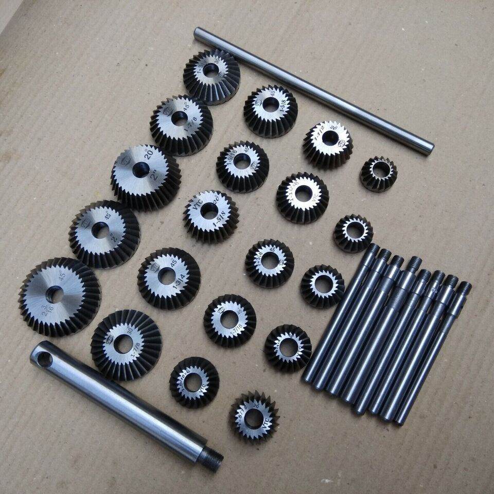 Comprehensive valve seat cutter set with multiple cutter sizes and tools for precision machining tasks