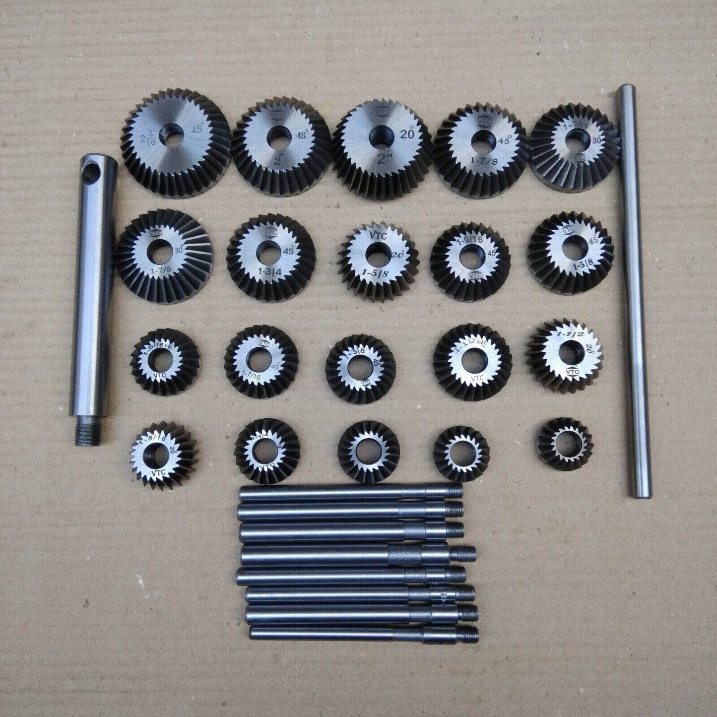 Valve seat cutter set with various multi-sized cutting tools and handles for precision machining