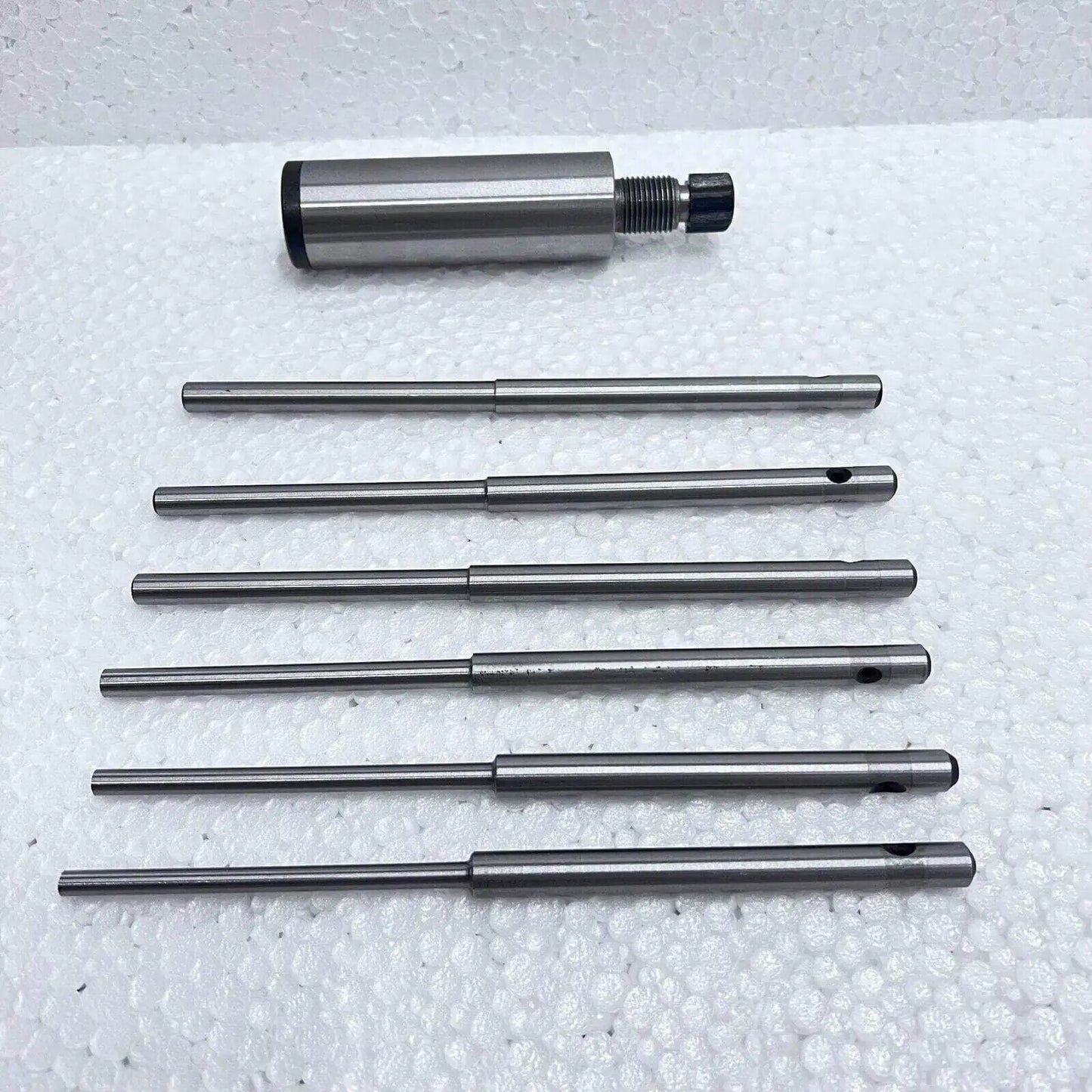 Valve seat grinding stone holder, steel, includes multiple grinding pilots for precision use