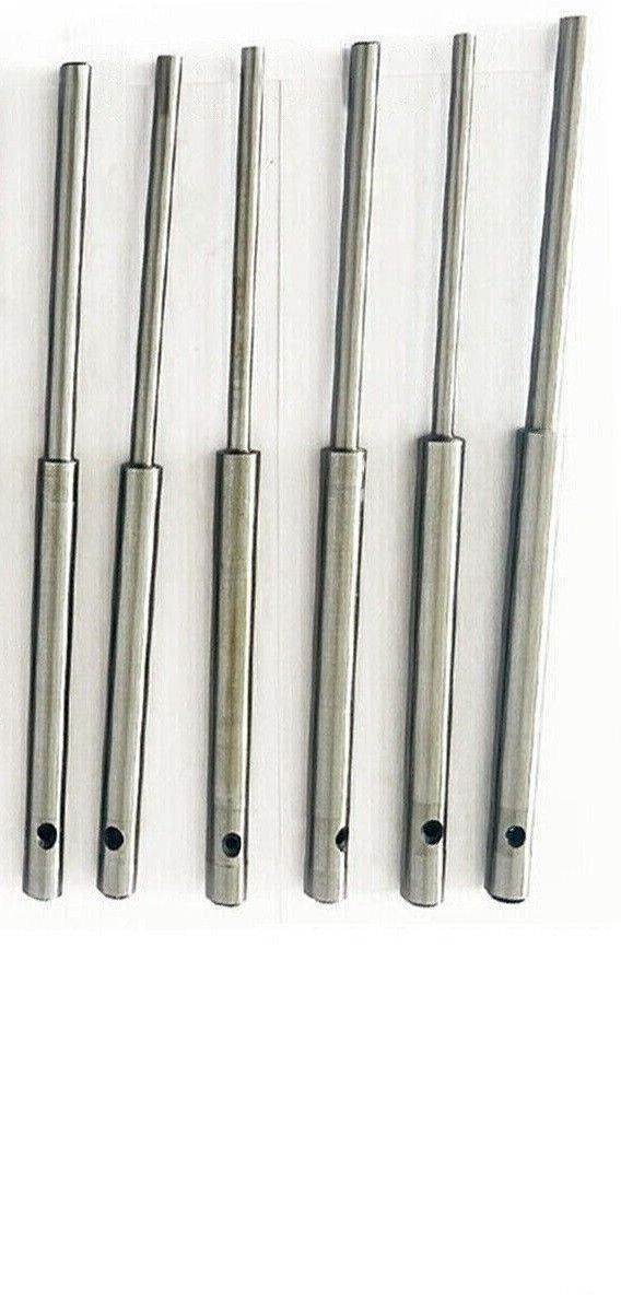 Valve seat grinding tool pilot set featuring six durable steel pilots for precise grinding