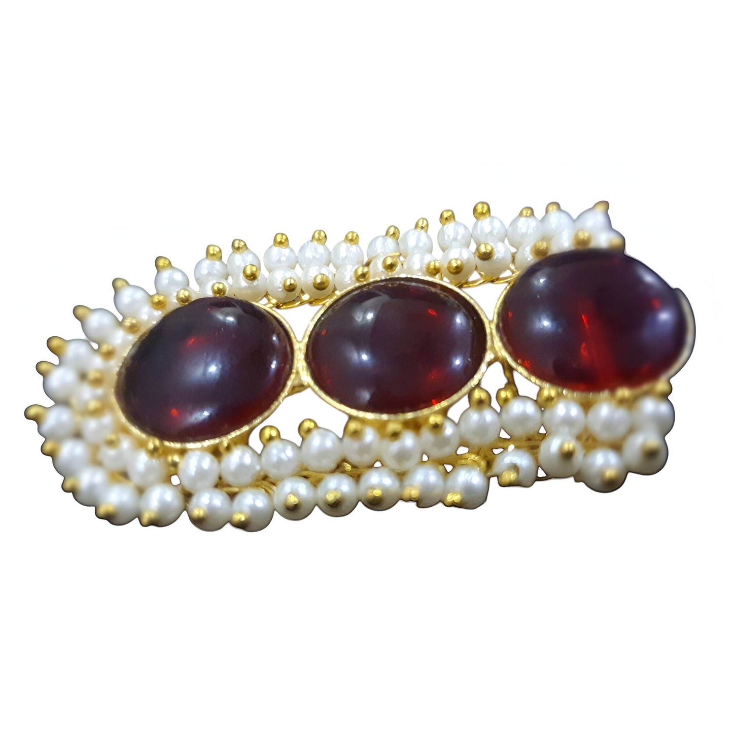 Vintage brass drop earrings featuring three red stones surrounded by white pearls for a classic look