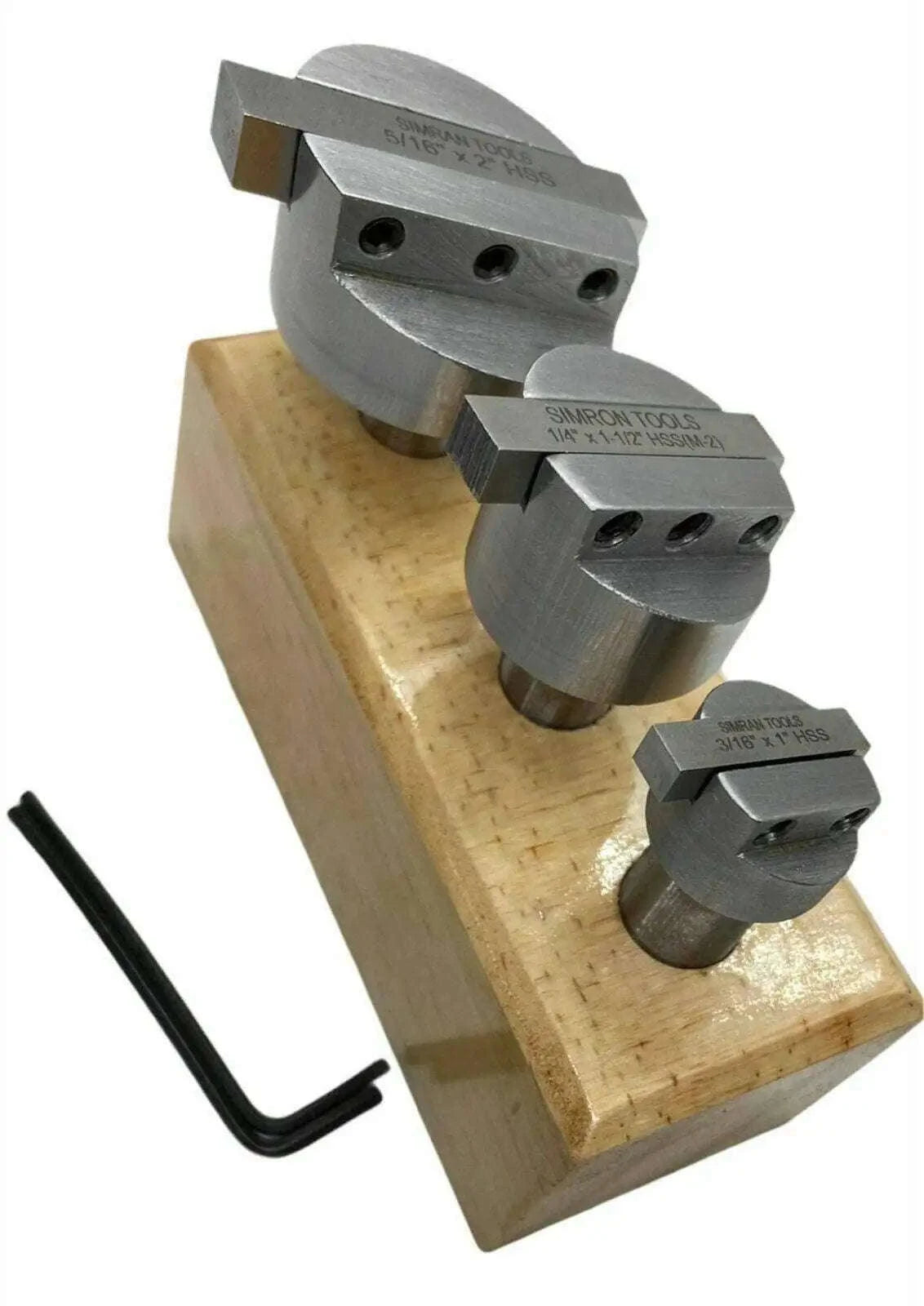 Hardened steel fly cutter set with three interchangeable cutter heads and hex key on wood block