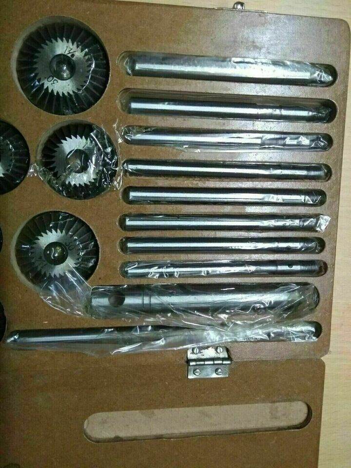 20 piece valve seat cutter set in a wooden case, featuring assorted cutting tools for precision machining