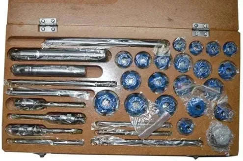 Carbide-tipped valve seat cutter kit with multiple reamers and stems, in a case