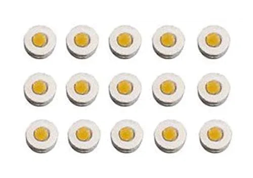 Set of ten round chakra magnet pads with yellow center buttons.