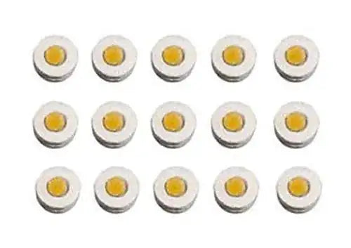 Set of ten round chakra magnet pads with yellow center buttons.